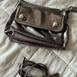 Authentic Coach Poppy RARE mini silver metallic patent leather cross body bag.